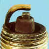 Spark plug with carbon fouling