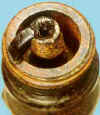 Spark plug with limited amounts of pre-ignition